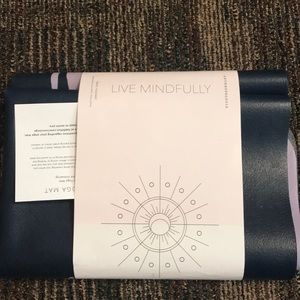 Never before used Anthropologie travel yoga mat